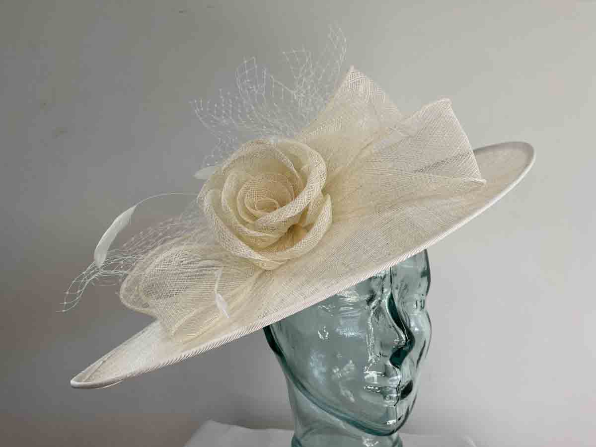 Large sinamay hatinator with sinamay rose in ivory