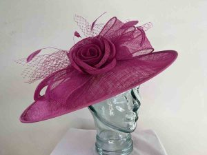 Large sinamay hatinator with sinamay rose in maganta