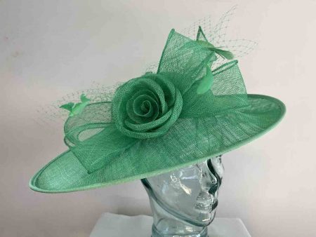 Large sinamay hatinator with sinamay rose in summer green