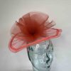 Crin fascinator with centre crin detail in tangeirne