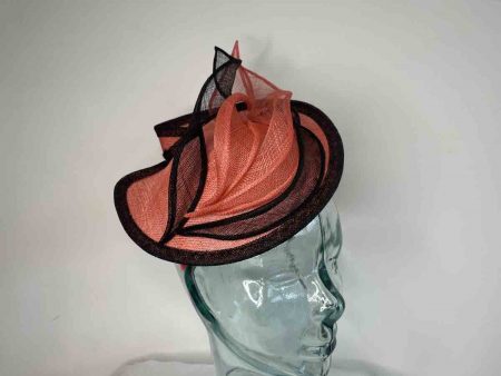 Small sinamay hatinator in tangerine and black