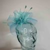 Crin fascinator with feathered flower in turquoise