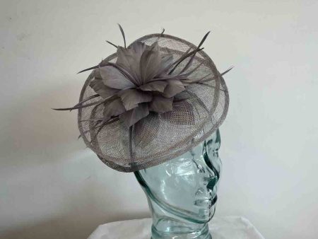 Sinamay fascinator with feathered flower in demin