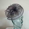 Sinamay fascinator with feathered flower in mercury