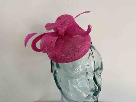 Pillbox fascinator with bow in calypso pink