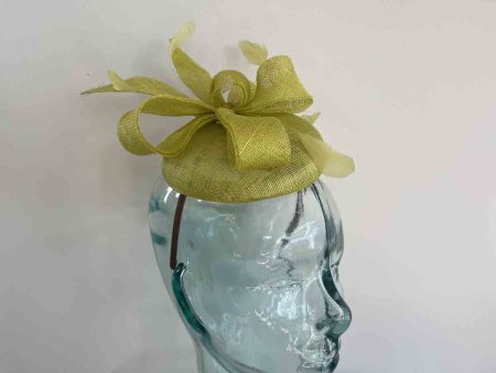 Pillbox fascinator with bow in citrus
