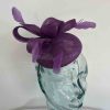 Pillbox fascinator with bow in grape