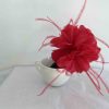 Feathered flower fascinator in carmine