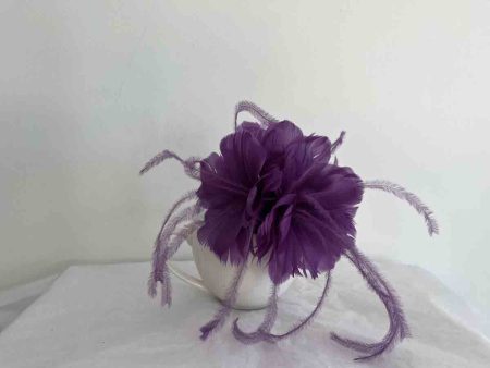 Feathered flower fascinator in grape