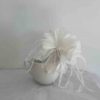 Feathered flower fascinator in ivory