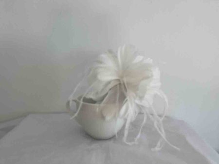 Feathered flower fascinator in ivory