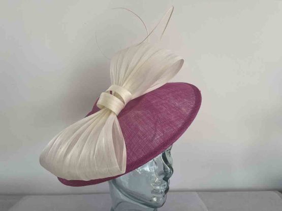 Down turned hatinator in fucshia and ivory