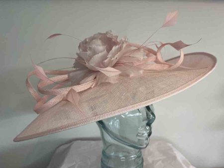 Large sinamay hatinator with feathered flower in chalk pink