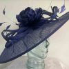 Large sinamay hatinator with feathered flower in cobalt