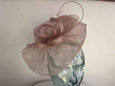 Sinamay fascinator with netting in crystal pink