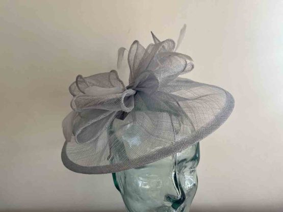Sinamay fascinator with feathers in cofnflower