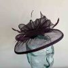 Sinamay fascinator with feathers in sloe