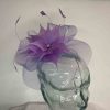 Crin fascinator with feathered flower in thistle