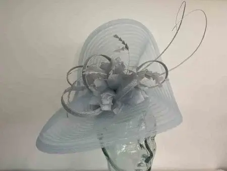 Pleated crin fascinator with feathered flowers in iced blue