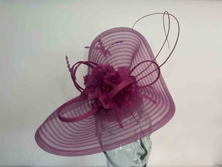 Pleated crin fascinator with feathered flowers in magenta pink