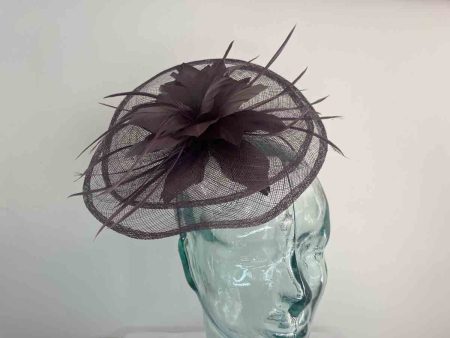 Sinamay fascinator with feathered flower in abuergine