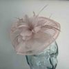 Sinamay fascinator with feathered flower in baby pink