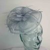 Sinamay fascinator with feathered flower in new baby blue