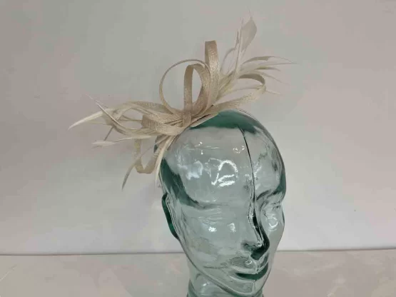 Loooped sinamay fascinator in champagne
