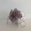 Feathered flower fascinator in taupe