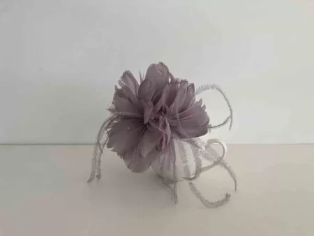 Feathered flower fascinator in taupe