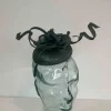 Pillbox fascinator with double flower in bottle