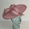Circular hatinator with open flower in rose pink