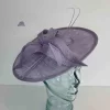 Circular hatinator with open flower in wisteria