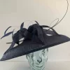 Downward turned hatinator with sinamay bow in midnight navy