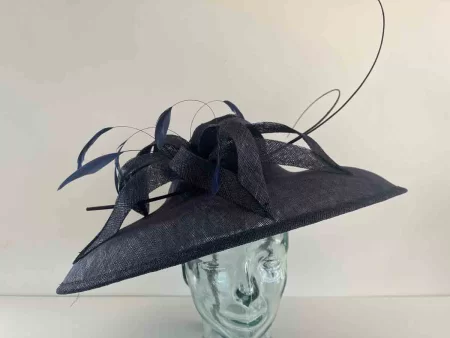 Downward turned hatinator with sinamay bow in midnight navy