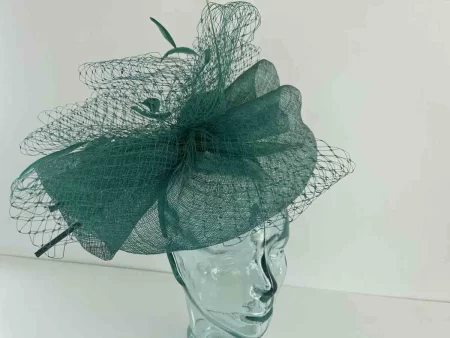 Sinamay fascinator with netting in emerald