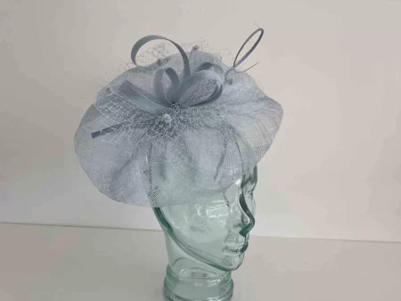 Sinamay fascinator with netting in new vista