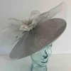 Oval hatinator with crin and feathered flower in ice