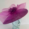 Oval hatinator with crin and feathered flower in magenta