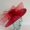 Oval hatinator with crin and feathered flower in red