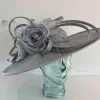 Large oval hatinator with triple flowers in metallic silver