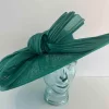 Large oval hatinator with large abaca bow in emerald