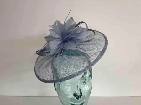Sinamay fascinator with feathered flower in babyblue