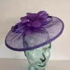 Sinamay fascinator with feathered flower in berry