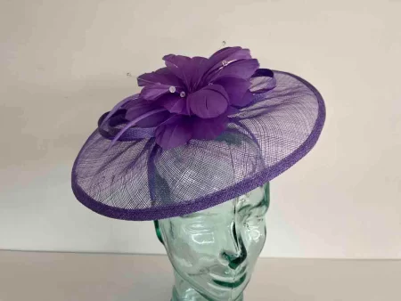 Sinamay fascinator with feathered flower in berry