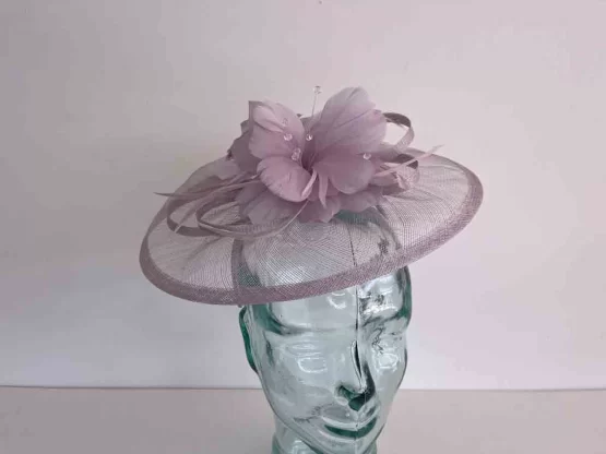 Sinamay fascinator with feathered flower in lilac