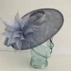Oval hatinator with large feathered flower in baby blue