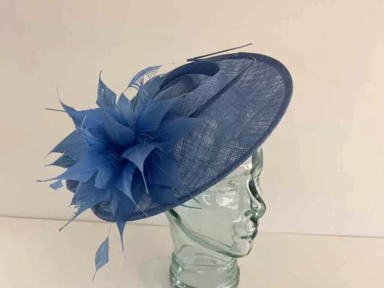 Oval hatinator with large feathered flower in cornflower