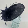 Oval hatinator with large feathered flower in navy