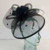 Crin fascinator with feathered flower in black